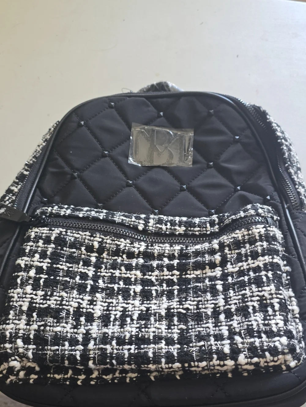 Badgley Mischka Black Quilted Backpack with Black and White Tweed Pocket